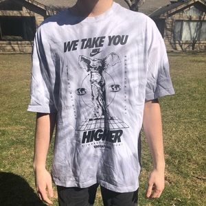 Nike we take you higher tee